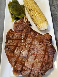 Steak and Corn on Plate